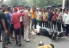 Dhanbad News: लोको बाजार में हाइवा की चपेट में आने से बाइक सवार की मौत, सड़क जाम