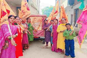 Koderma News: 55वीं निशान यात्रा में भक्तिभाव से झूमे श्रद्धालु, श्याम मंदिर में अर्पित किया निशान